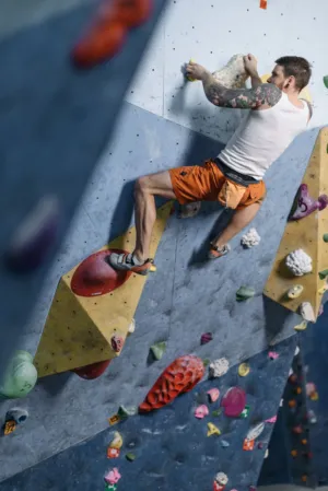 Man Climbing Indoor Wall