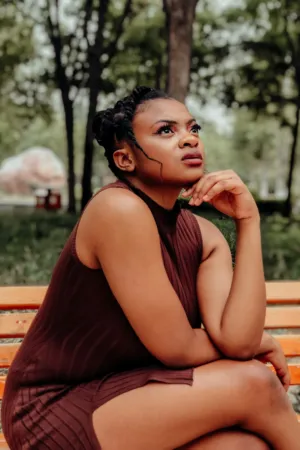Pensive Woman In Park