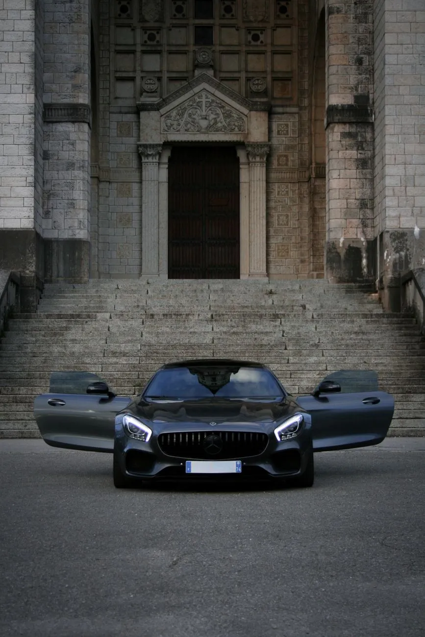 Luxury Car In Front Of Cathedral