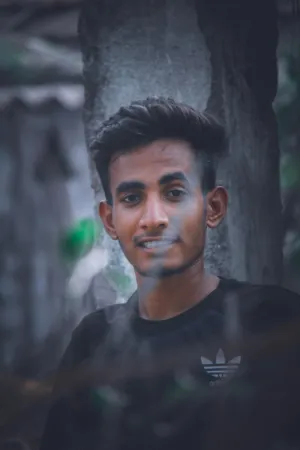 Young Man In Black Adidas Shirt