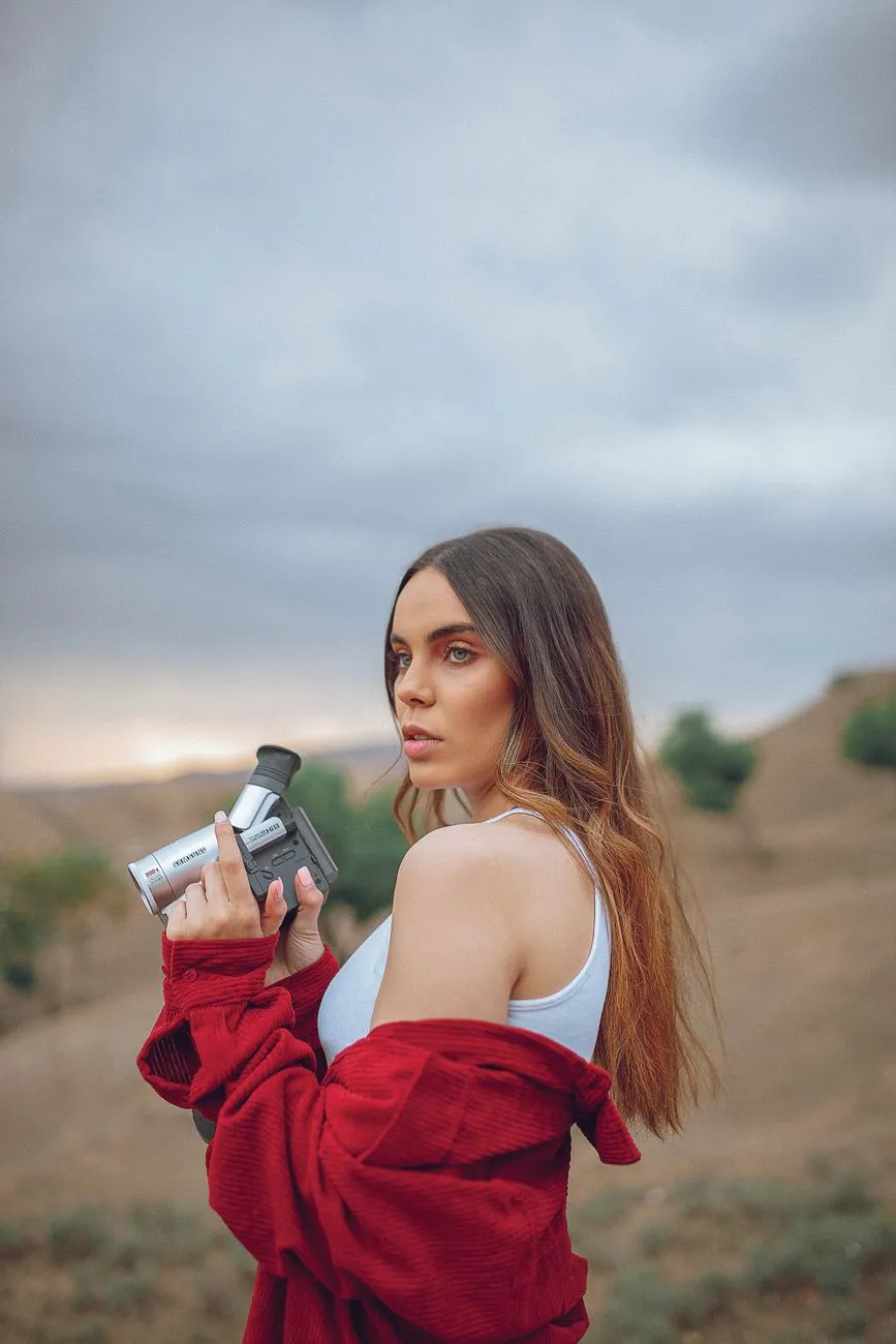 Young Woman With Retro Camera