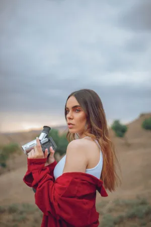 Young Woman With Retro Camera