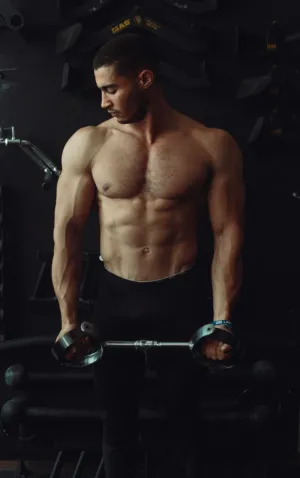 Muscular Man Lifting Weights