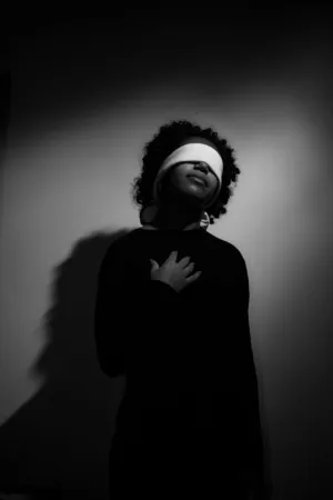 Blindfolded Figure