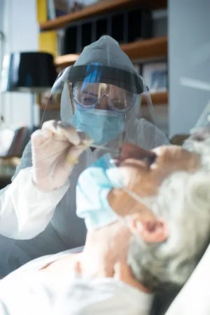 Medical Professional Administering A Test
