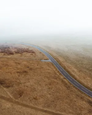 Curved Road In The Mist