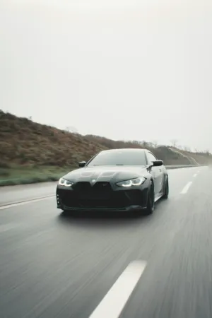 Black Bmw On The Road