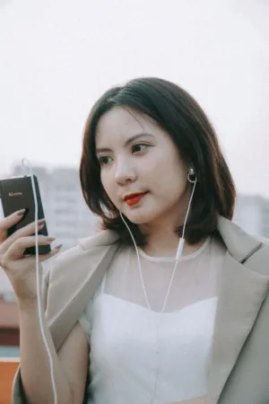 Elegant Woman With Earphones