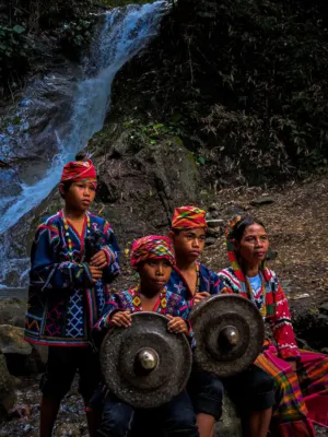 Traditional Clothing And Waterfall