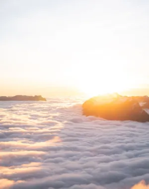 Sunrise Over The Clouds
