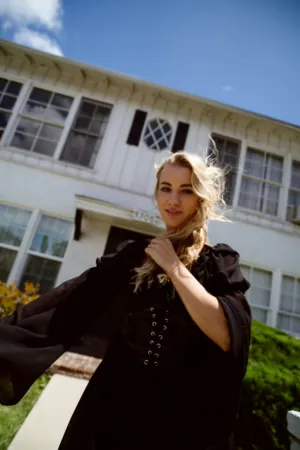 Black Dress In Front Of House