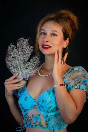 Elegant Woman In Blue Top