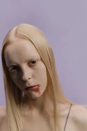 Blond Model With Blood Stain