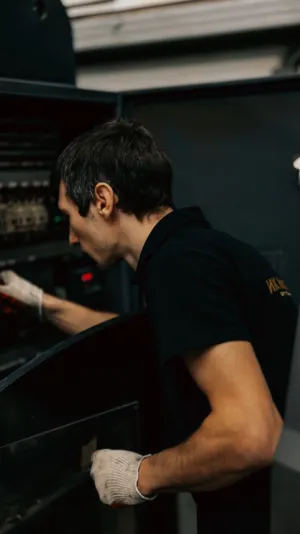 Mechanic Working On Machinery
