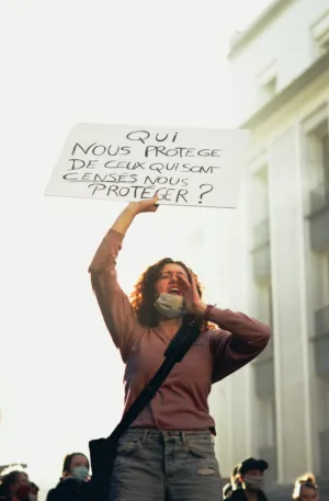 Protestor With Sign