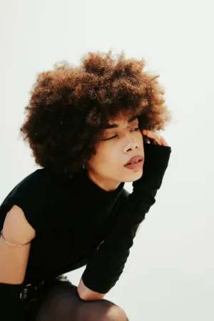 Crouching Model With Afro