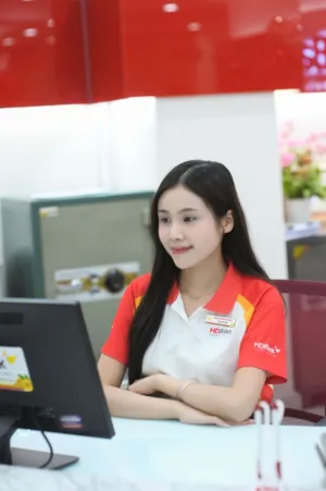 Bank Teller At Work