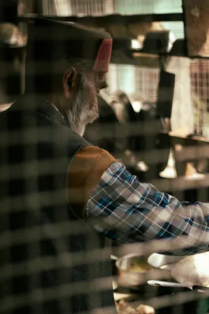 Old Man In Traditional Clothing