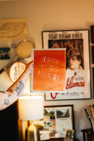 Book Cover With 'Nobody Reads Anymore' Quote