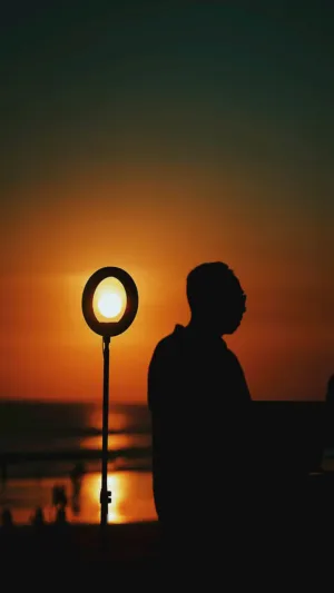 Silhouette Of A Person At Sunset