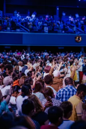 Crowd Clapping In Concert Hall