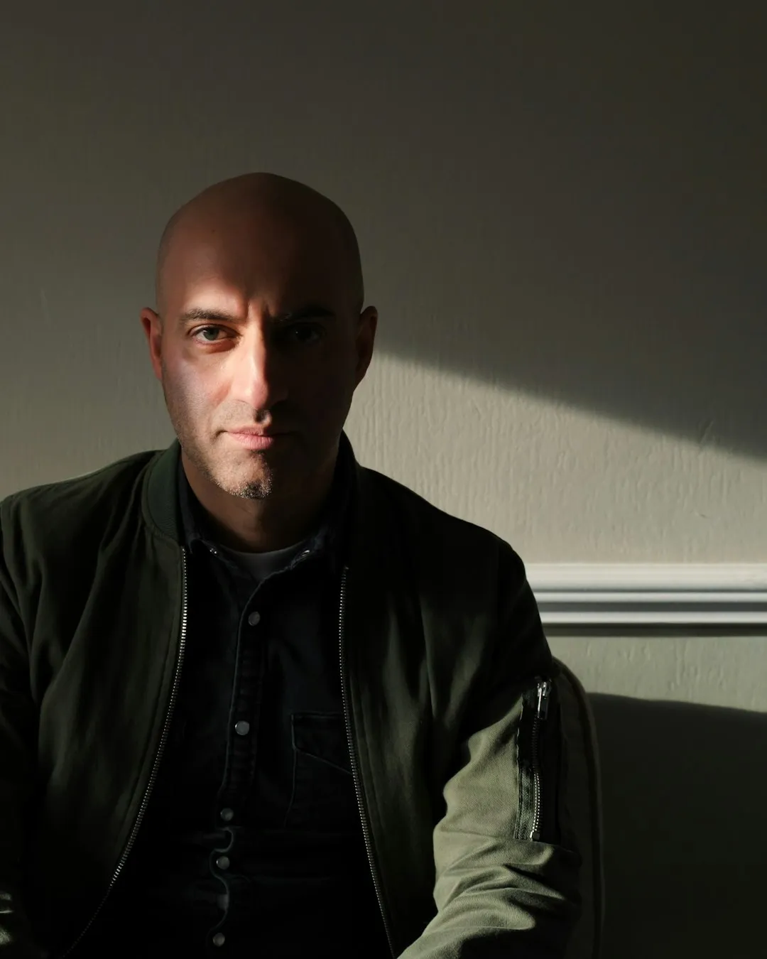 Bald Man In Dark Clothing