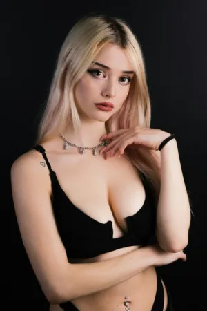 Blonde Model In Black Bra