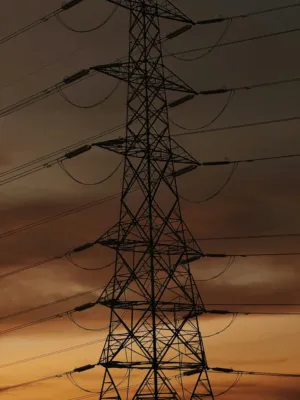 Electricity Pylon At Sunset