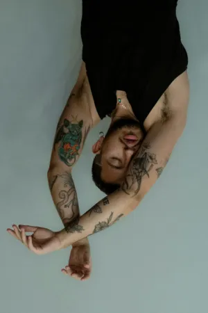 Tattooed Person In Black