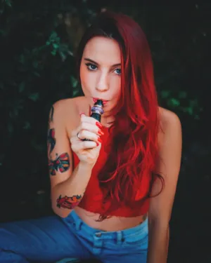 Red-Haired Woman With Tattoos