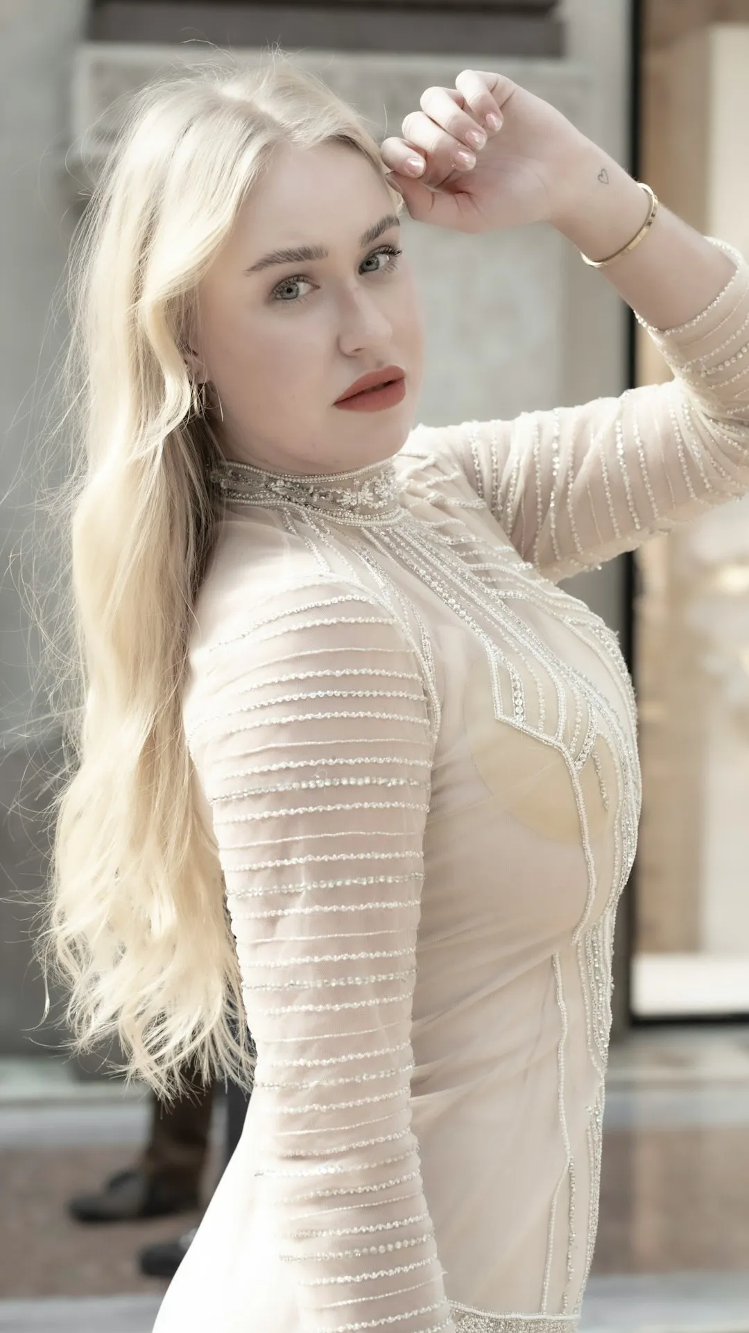 Elegant Blonde In Sparkling Dress