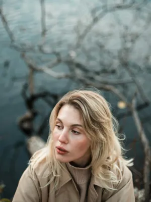 Blond Woman By The Water