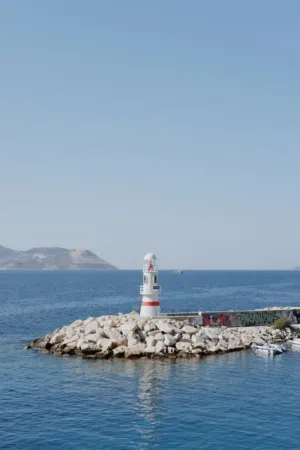 Lighthouse On A Rocky Outcrop