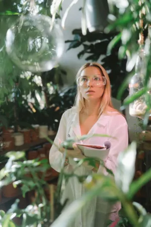 Botanist In A Greenhouse