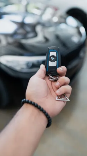 Hand Holding Bmw Car Key