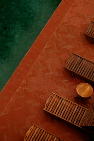 Swimming Pool And Wooden Chairs