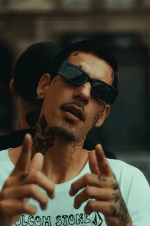 Tattooed Man With Sunglasses