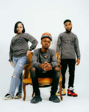 Three Individuals In Casual Attire