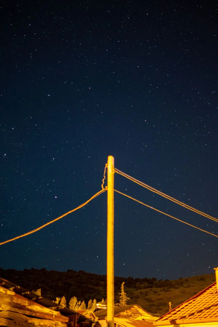 Starry Night Sky With Power Lines