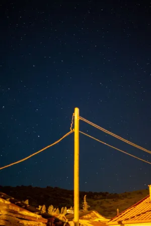 Starry Night Sky With Power Lines