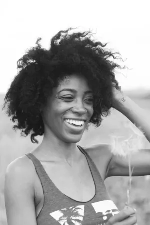 Black And White Portrait Of A Woman With Curly Hair