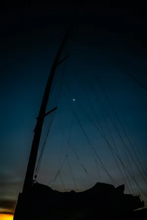Sailboat Silhouette At Dusk