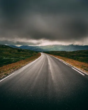 Empty Road In A Mountainous Landscape