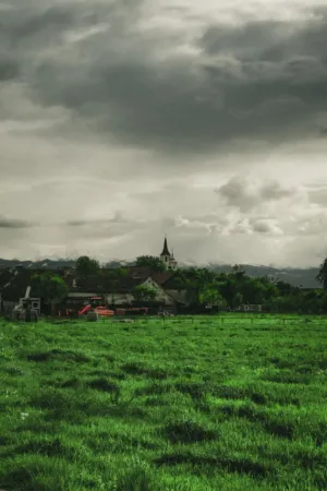 Village Under A Stormy Sky