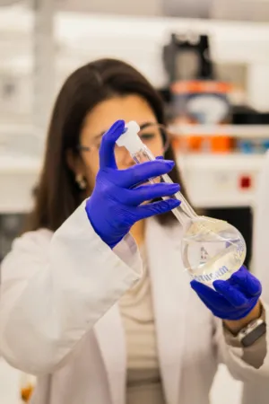 Scientist Examining Flask