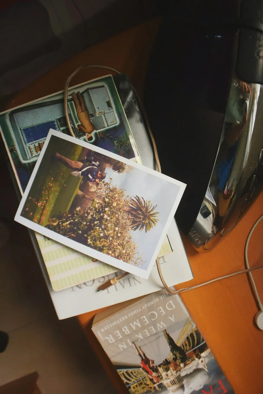 Desk With Books And Postcards