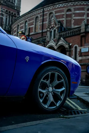 Blue Car On Urban Street