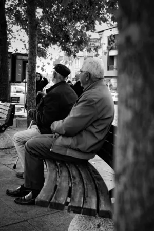 Two Elderly Men On A Bench