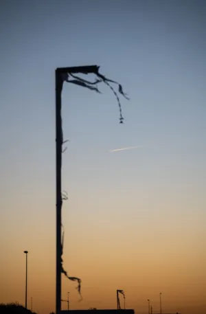 Silhouette Of A Damaged Structure At Sunset