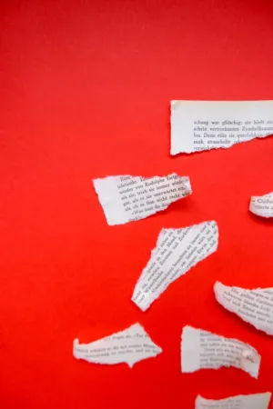 Torn Paper On Red Background